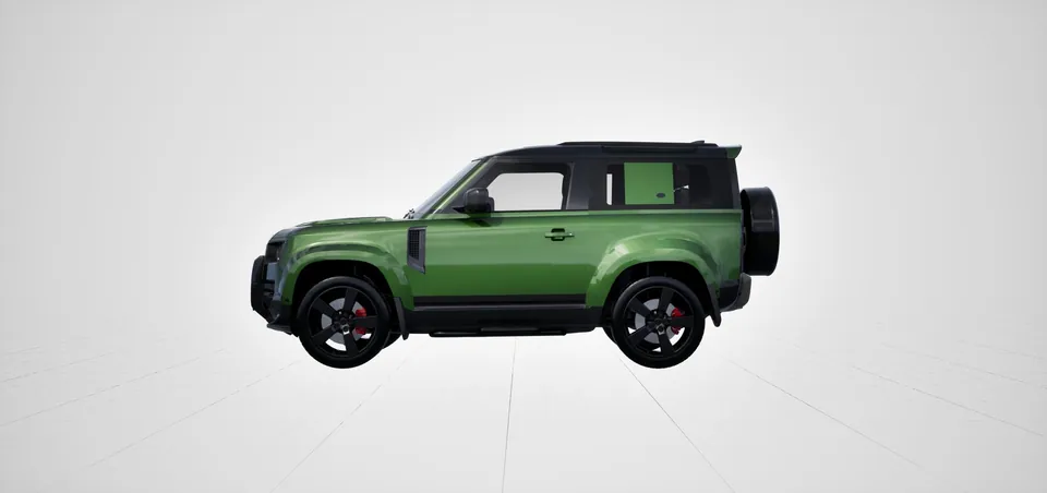 A green Land Rover Defender configured in Spaces
